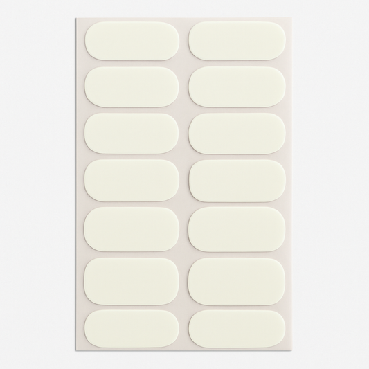 Sheet of ivory beige nail wraps on a light grey background by Stellia Beauty