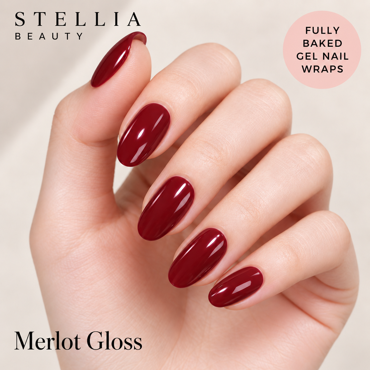 Stellia Beauty Merlot Gloss fully cured gel nail wraps on manicured hands.