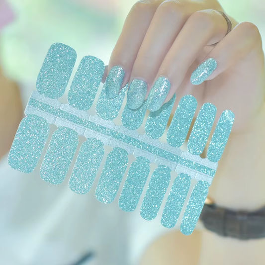 Sheet of Sparkling Sky Blue glitter nail wraps by Stellia Beauty