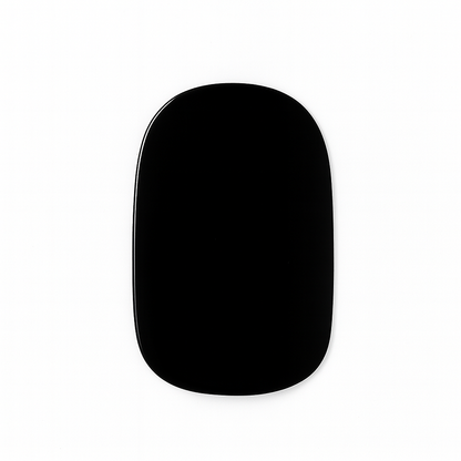 Close-up of a glossy black UV-free gel nail wrap by Stellia Beauty