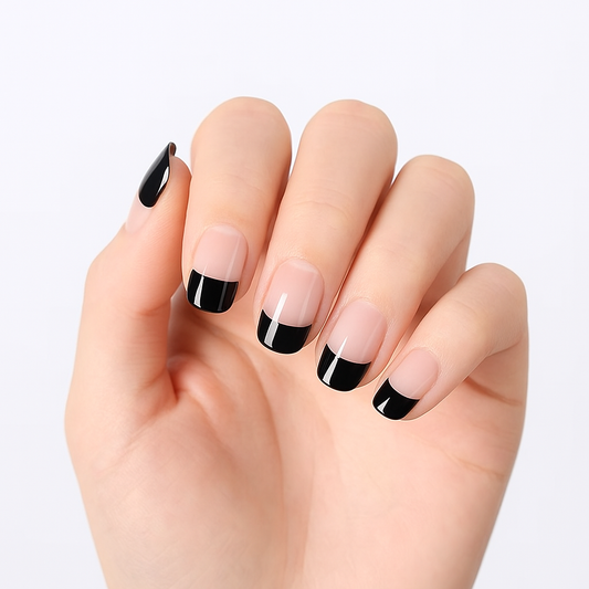 hand showing black tip gel nail wraps by Stellia Beauty