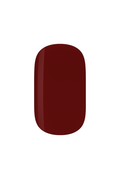 Close-up of a burgundy semi-cured gel nail wrap by Stellia Beauty