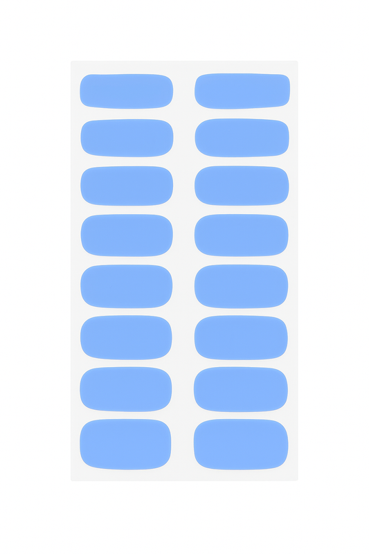 Sheet of blue gel nail wraps on a white background by Stellia Beauty