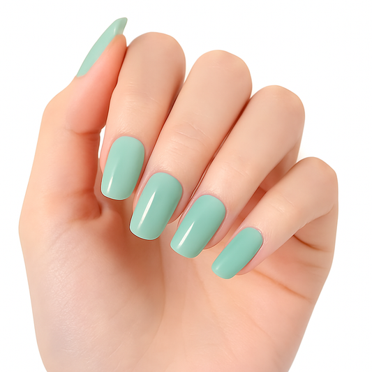 Hand with Green semi cured gel nail wraps on a white background by Stellia Beauty