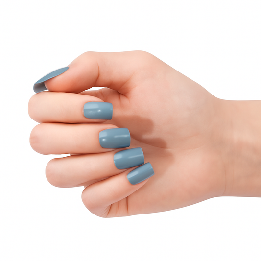 Hand with grey semi cured gel nail wraps on a white background by Stellia Beauty