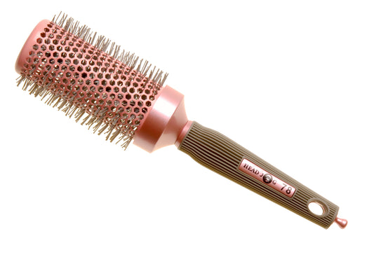 Head Jog 78 Radial Brush Pink 43mm Rose gold hairbrush with round bristle design on a white background by Stellia Beauty