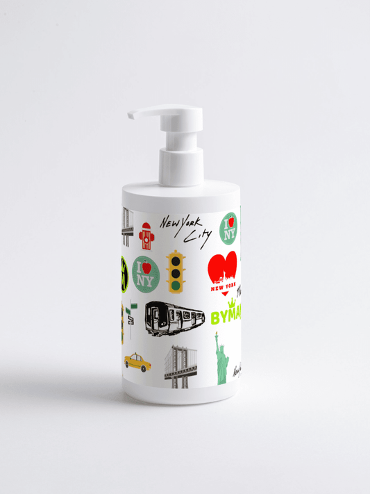 White bottle with New York City-themed design on a white background Hydrating Gloss Shampoo Vegan & Natural BYMANYC ® New York Stellia Beauty