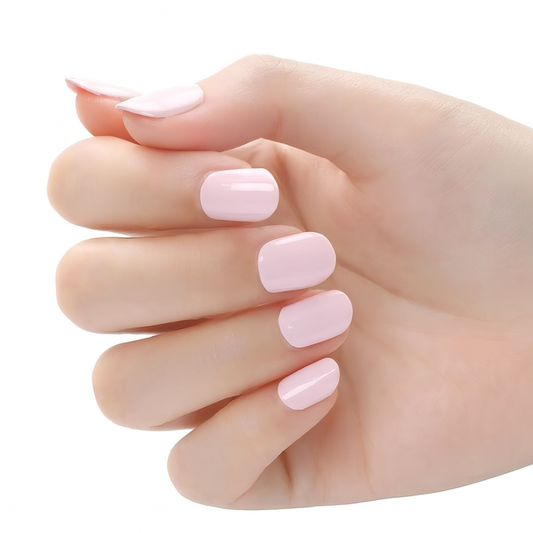Hand with Light Pink Semi-Cured Gel Nail Wraps on a white background by Stellia Beauty