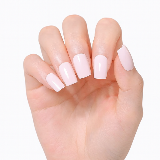Hand with pink gel nail wraps on a white background by Stellia Beauty