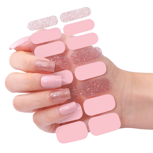Hand showing pink glitter and soft pastel pink nail wraps with matching wrap sheet – sparkling and elegant manicure