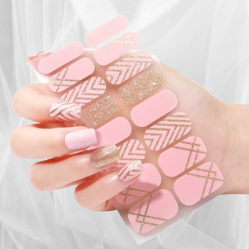 Pink and gold glitter nail wraps with blush base and geometric accents – peel and stick gel-effect nails