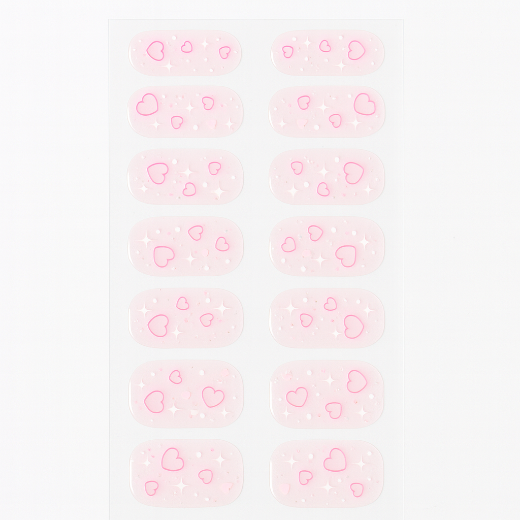 Pattern of pink hearts gel nail wraps on a light pink background by Stellia Beauty