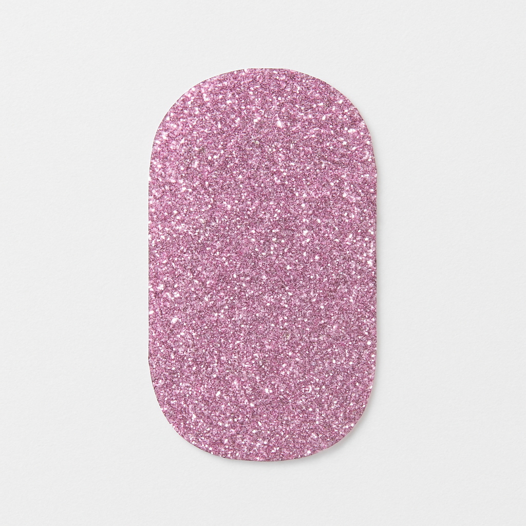Pink glittery nail wrap on a light grey background by Stellia Beauty