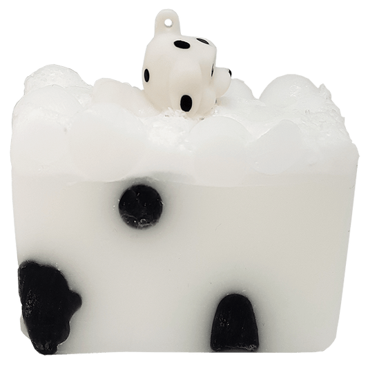 Puppy Love Soap Slice White dog-shaped candle with black paws on a clear background by Stellia Beauty
