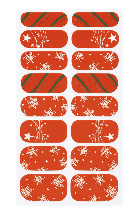 Sheet of red nail wraps with white snowflakes and green stripes on a white background by Stellia Beauty