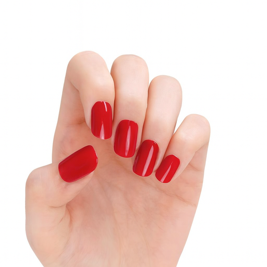 Hand with Red Semi-Cured Gel Nail Wraps on a white background by Stellia Beauty