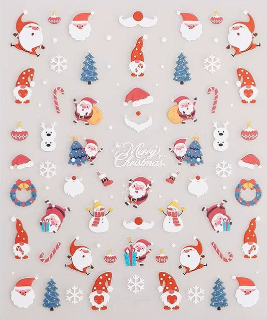 Sheet of Christmas nail stickers featuring Santa Claus, snowmen, Christmas trees, candy canes, wreaths, reindeer and festive holiday designs by Stellia Beauty