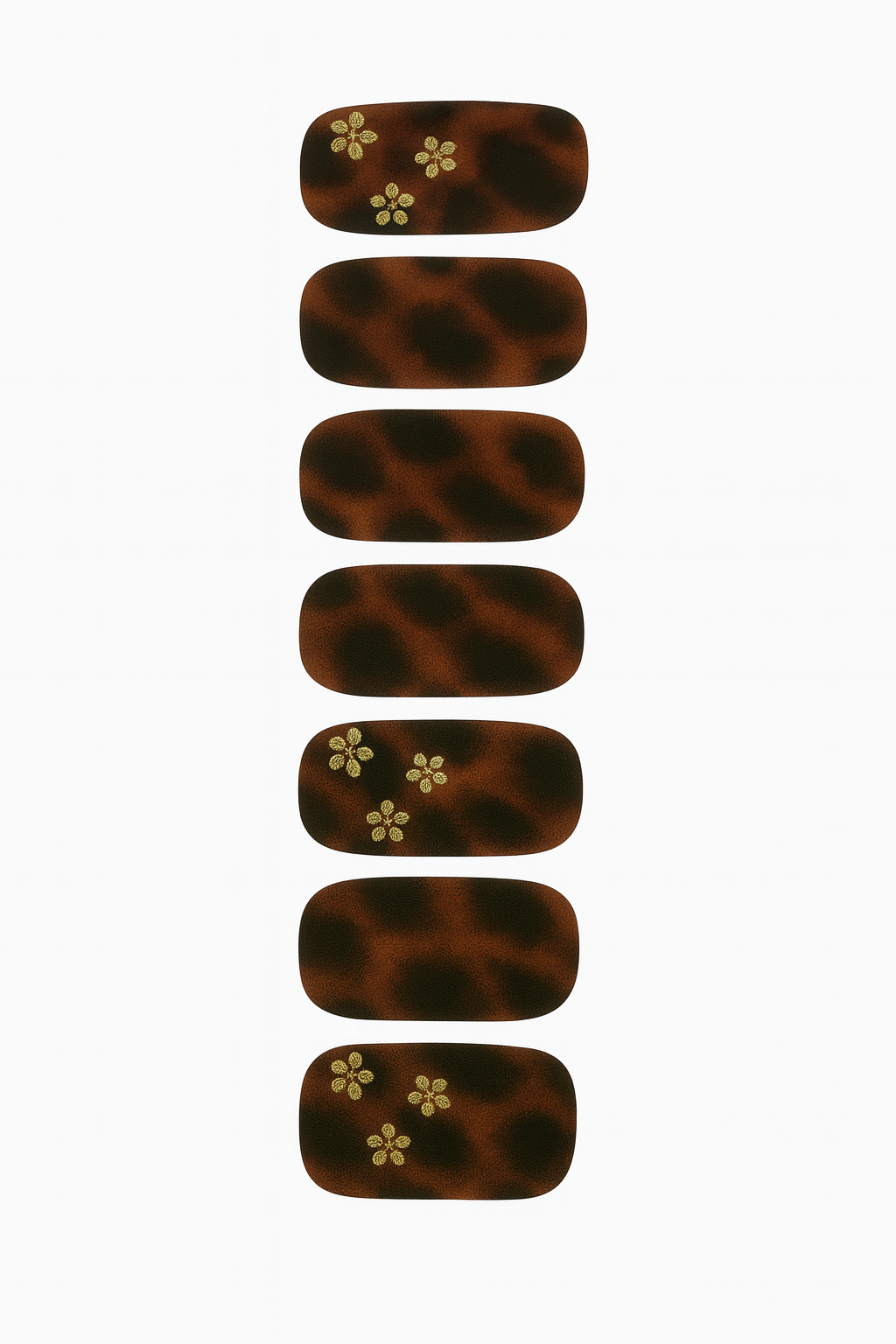 Set of tortoiseshell nail wraps with floral designs on a white background by Stellia Beauty
