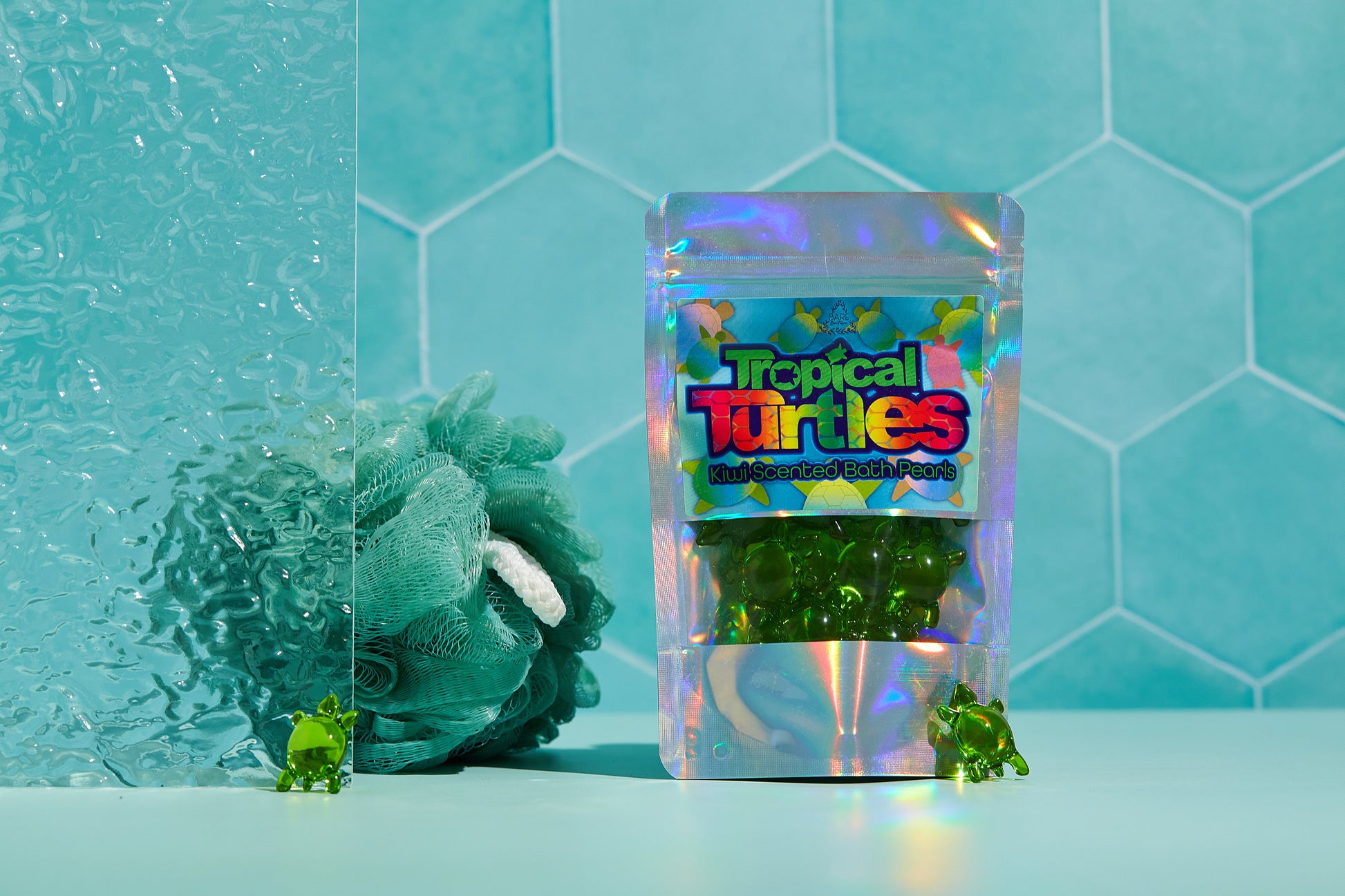 Tropical Turtles - 10 Pack Kiwi Scented- bath pearls on a green background Bare Boutique Stellia Beauty
