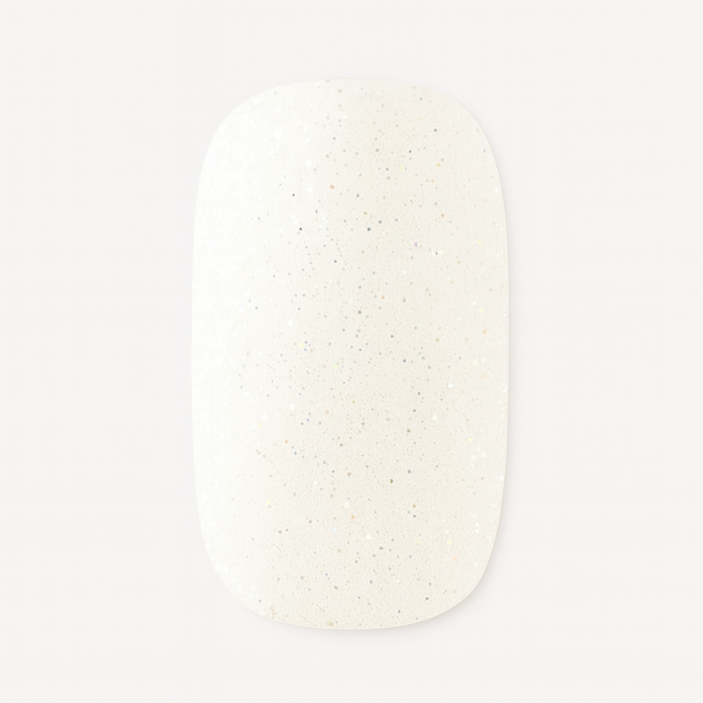 White shimmer nail wrap on a white background by Stellia Beauty
