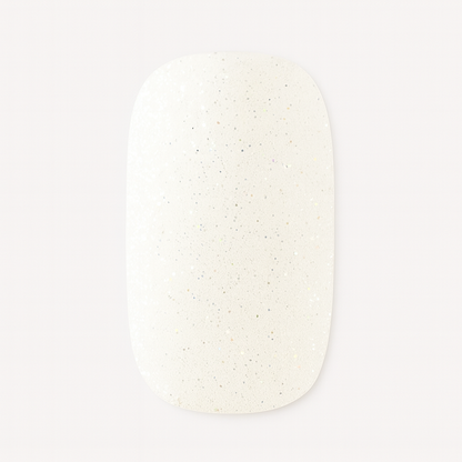 White shimmer nail wrap on a white background by Stellia Beauty