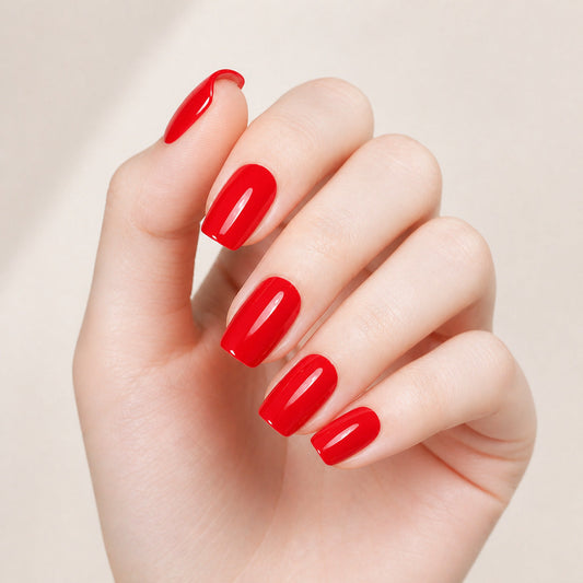 Bright Red Gel Nail Wraps – Fully Cured, No UV Light Required manicure on hand – Stellia Beauty