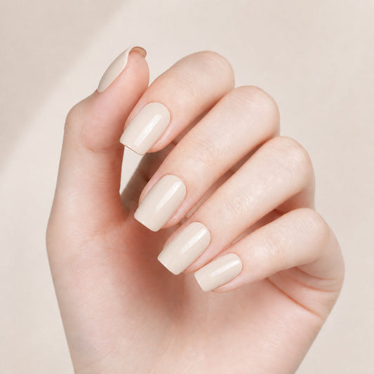 Ivory Beige Nail Wraps – Clean & Classic Neutral Finish manicure on hand – Stellia Beauty