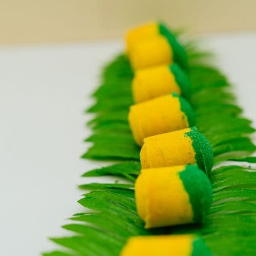 bath bomb made of yellow and green on a white background by Stellia Beauty