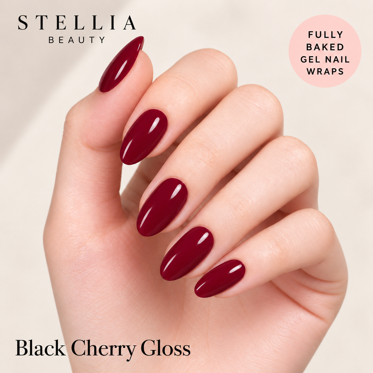 Stellia Beauty Black Cherry Gloss fully cured gel nail wraps on manicured hands.