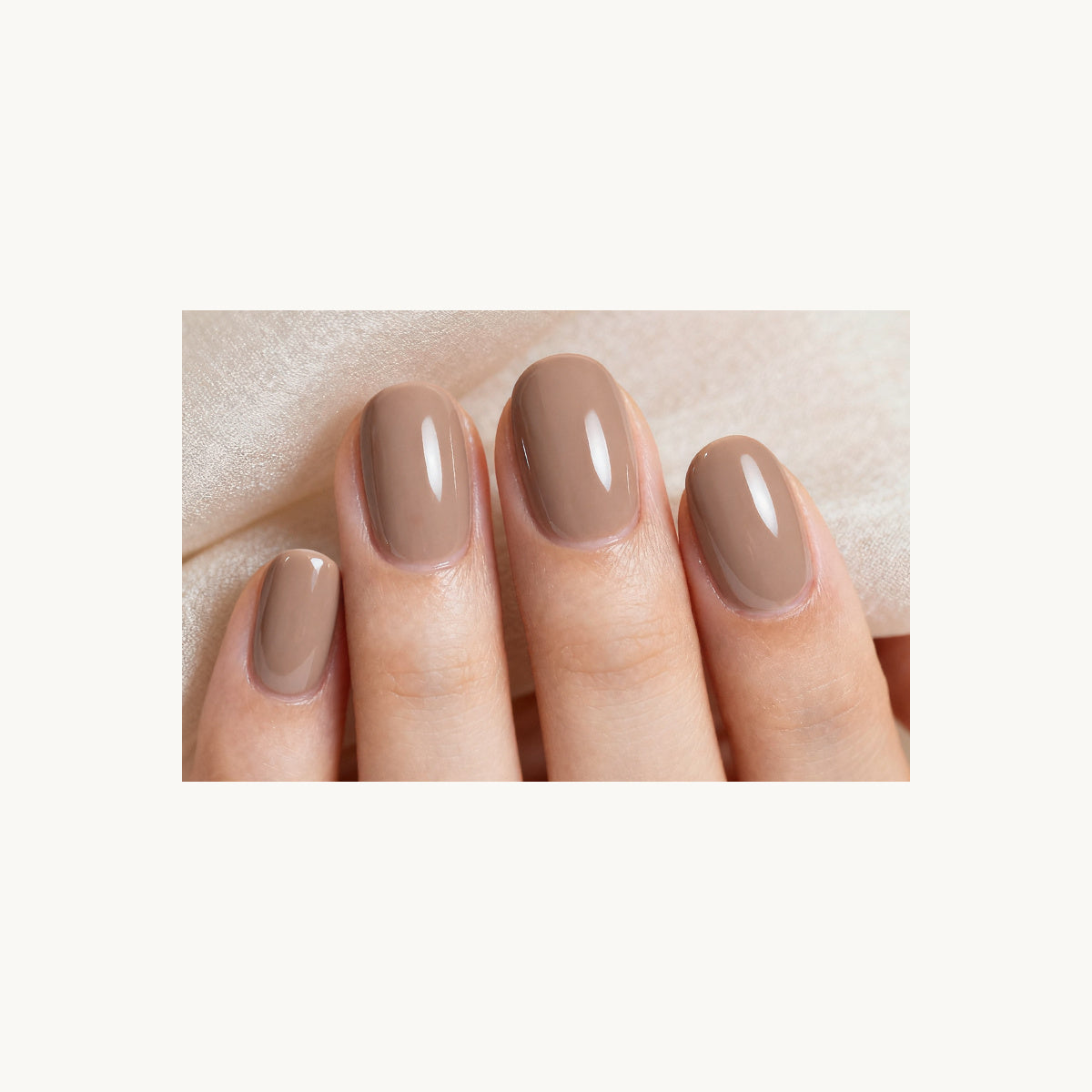 Stellia Beauty Cocoa Cashmere nail wraps in a second glossy warm taupe nude manicure view