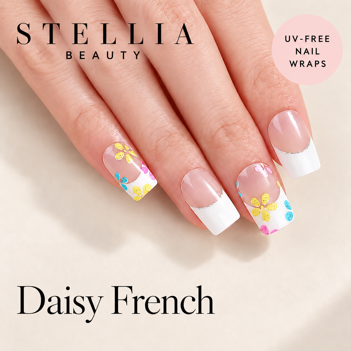 Stellia Beauty Daisy French nail wraps on manicured hands with white French tips and colourful daisy accents.
