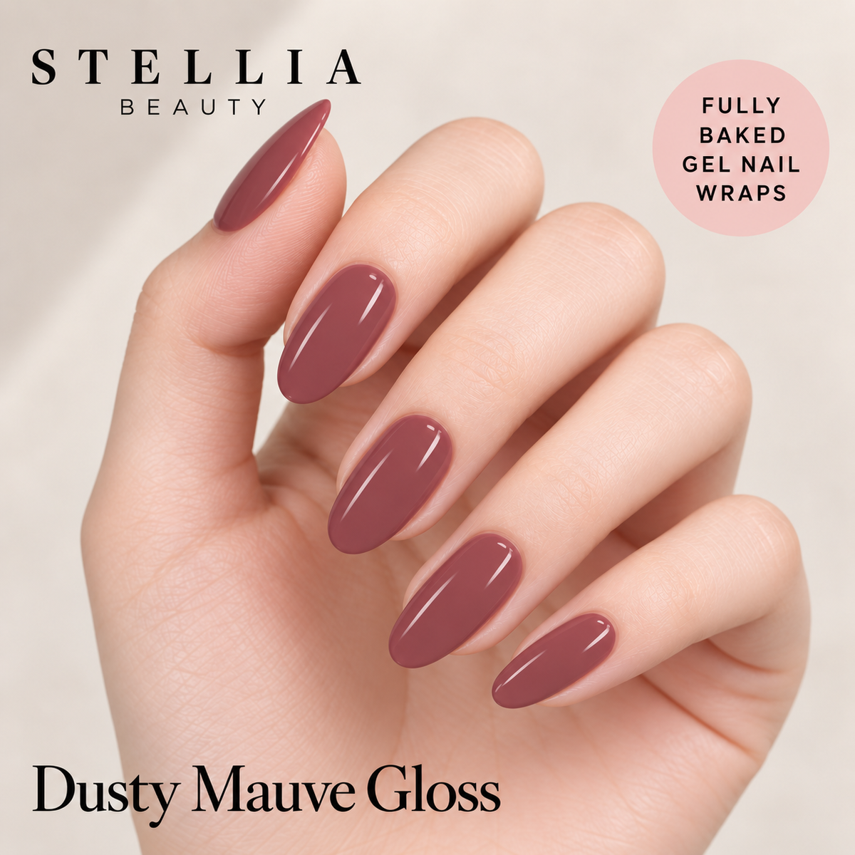 Stellia Beauty Dusty Mauve Gloss fully cured gel nail wraps on manicured hands.