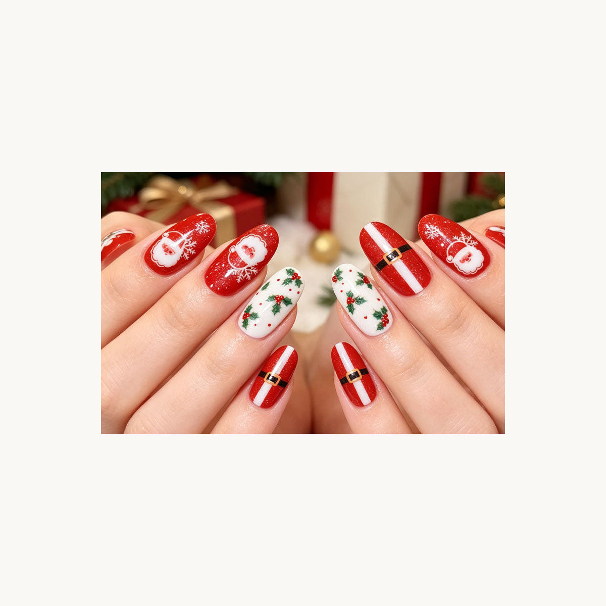 Stellia Beauty Holly Jolly Christmas nail wraps in a second red, white and green Christmas motifs with Santa, holly and a belt manicure view