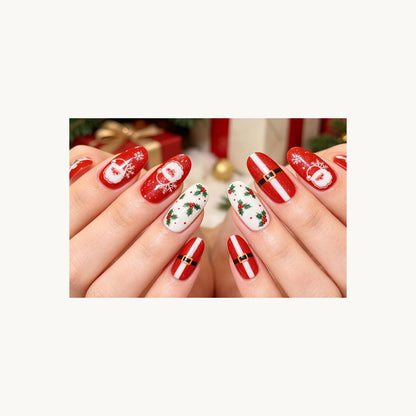 Stellia Beauty Holly Jolly Christmas nail wraps in a second red, white and green Christmas motifs with Santa, holly and a belt manicure view