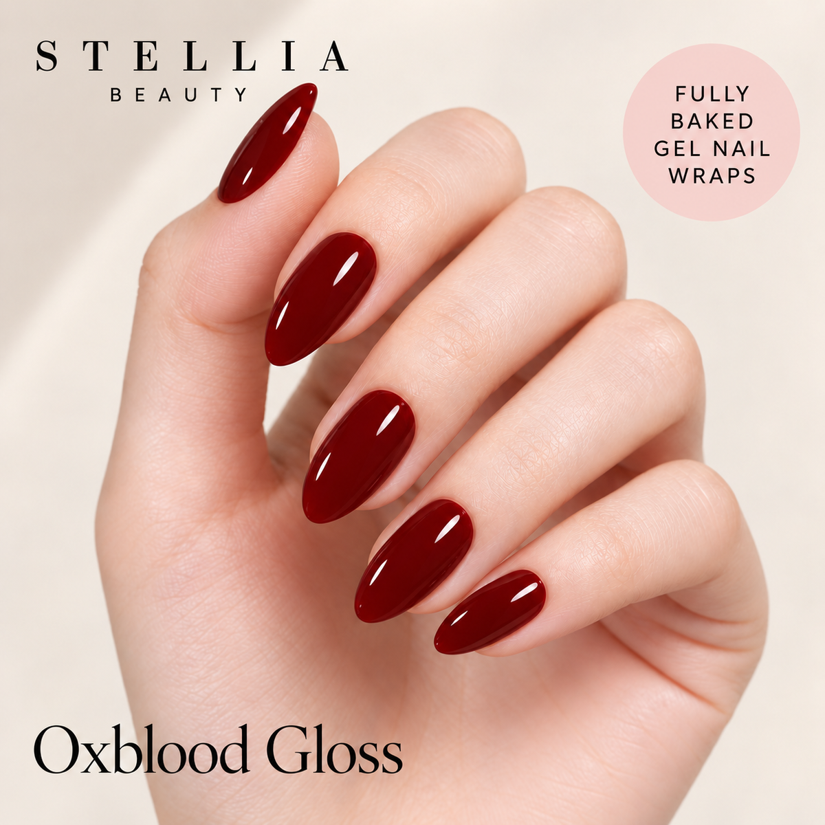 Stellia Beauty Oxblood Gloss fully cured gel nail wraps on manicured hands.