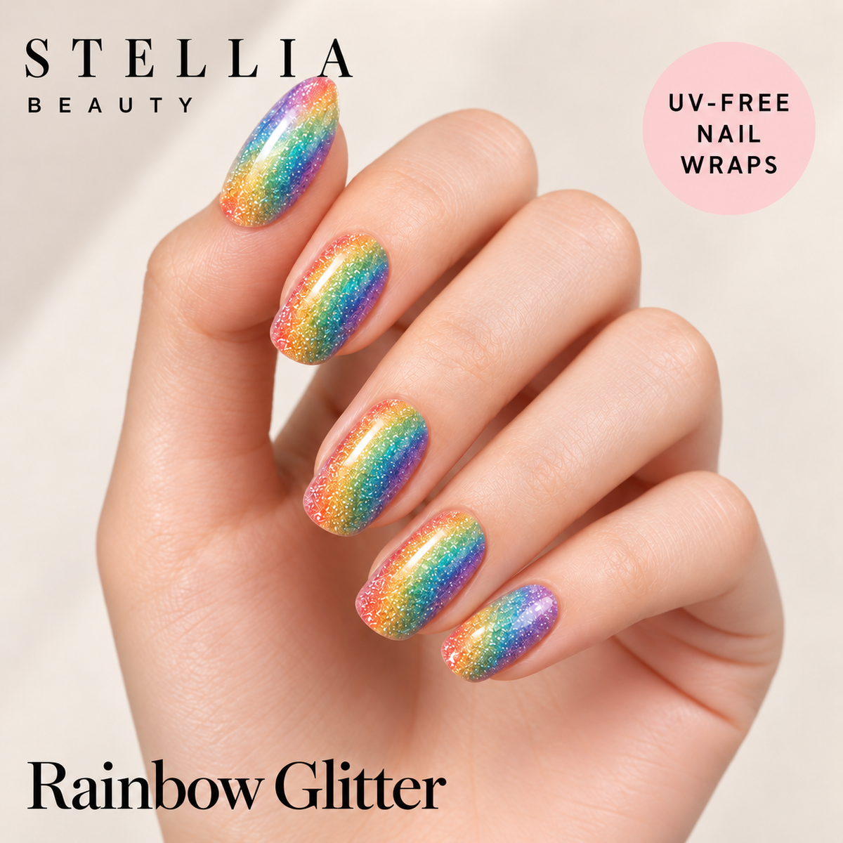 Stellia Beauty Rainbow Glitter nail wraps on manicured hands with vibrant rainbow glitter.