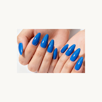 Stellia Beauty Riviera Blue nail wraps in a second glossy royal blue manicure view
