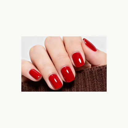 Stellia Beauty Ruby Red nail wraps in a second glossy bright red manicure view