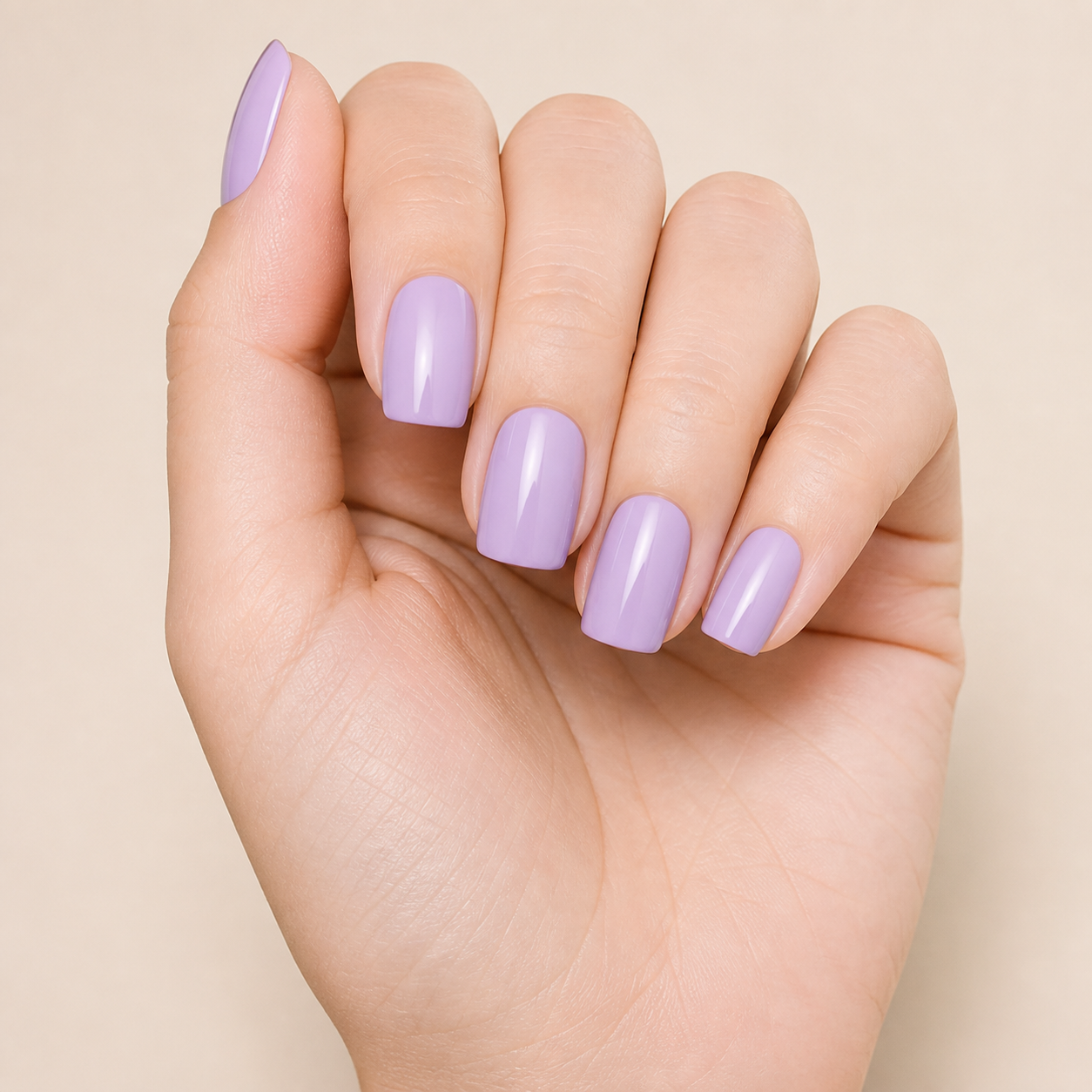 Stellia Beauty Soft Lilac nail wraps on a glossy pastel lilac manicure