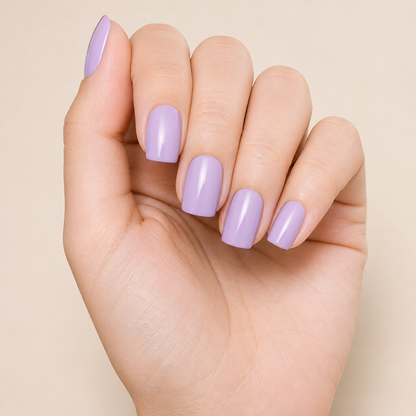 Stellia Beauty Soft Lilac nail wraps on a glossy pastel lilac manicure