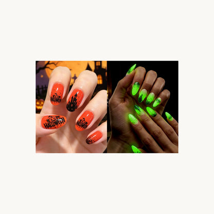 Stellia Beauty Spooky Glow Halloween nail wraps in a second orange-red and black Halloween motifs with castles, bats and lettering manicure view